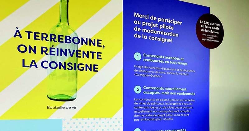 Pancarte sur le projet pilote de la consigne